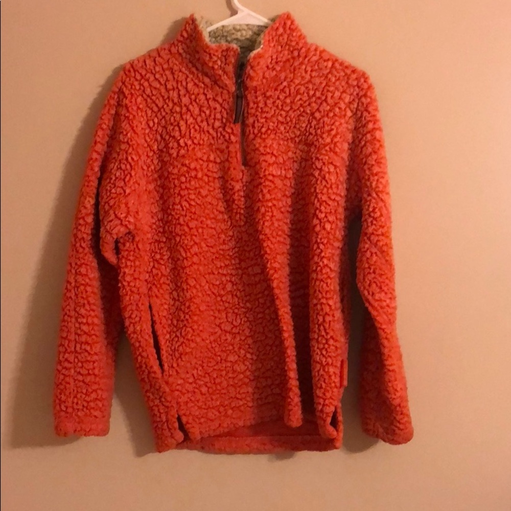 Orange furry pullover